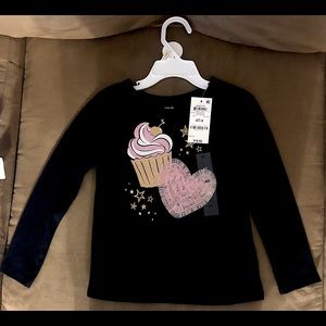 Long sleeve black toddler shirt in the size 4T. Best fit for toddler 32-37 lbs.
